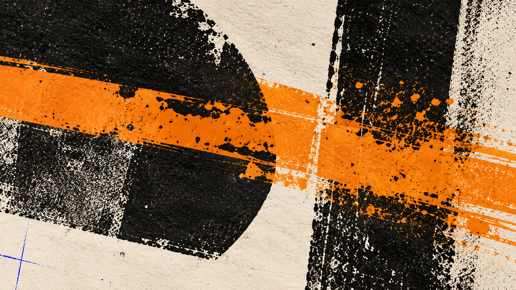 Macro detail of black ink and a single amber-orange brush stroke printed across uncoated paper.